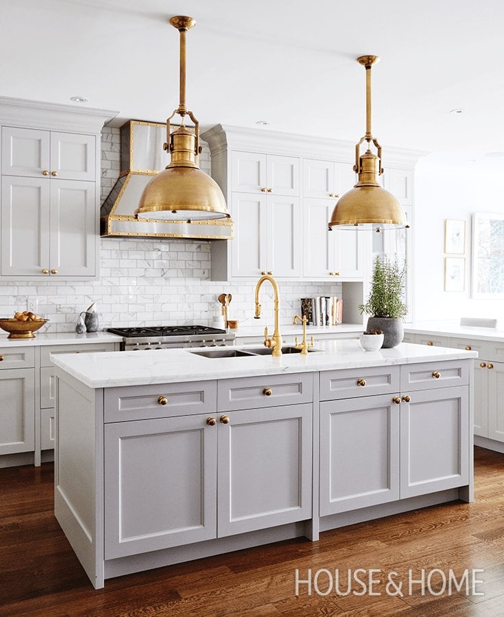 grey and gold kitchen gorgeous hood and antique brass pendants over island