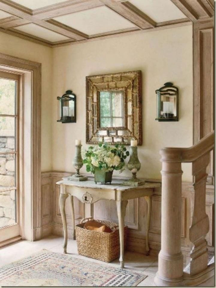 antique baskets entry way under console table french country style gold mirror sconces
