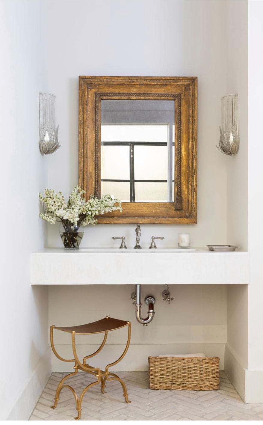 fabulous antique gold mirror in contemporary bathroom