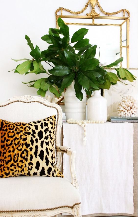 decorating-with-animal-hides-leopard-pillow-chic