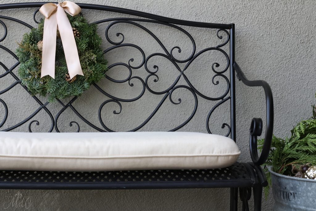 christmas front porch bench wreath ribbon charming