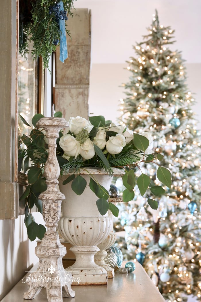 white roses in French country entry way with gorgeous Christmas tree holiday decorating ideas