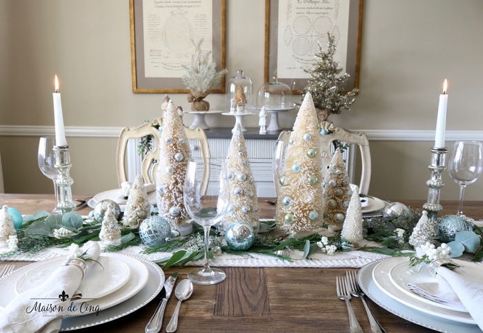 French country dining room with white silver and blue holiday tablescape decor 