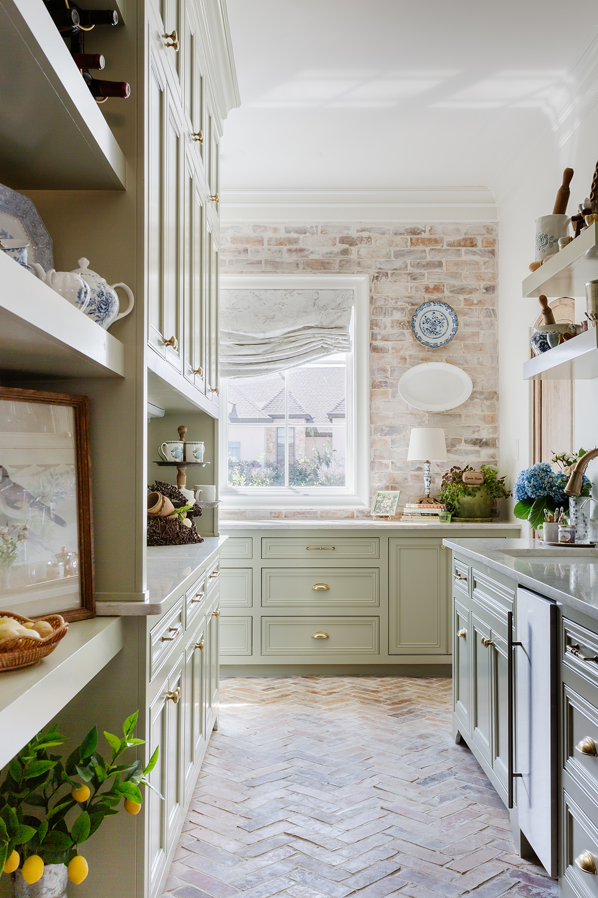 French farmhouse pantry kitchen with brick walls and floors 