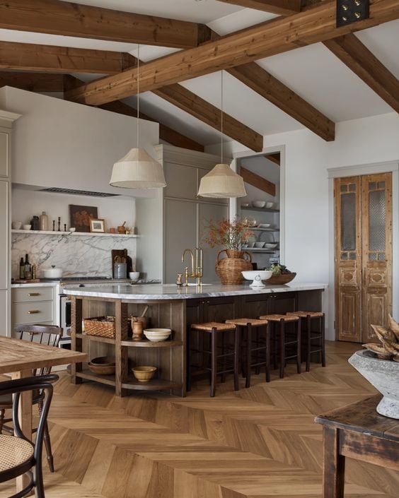 home design trends for 2024 wood treatments kitchen with wood beams, floors and island 