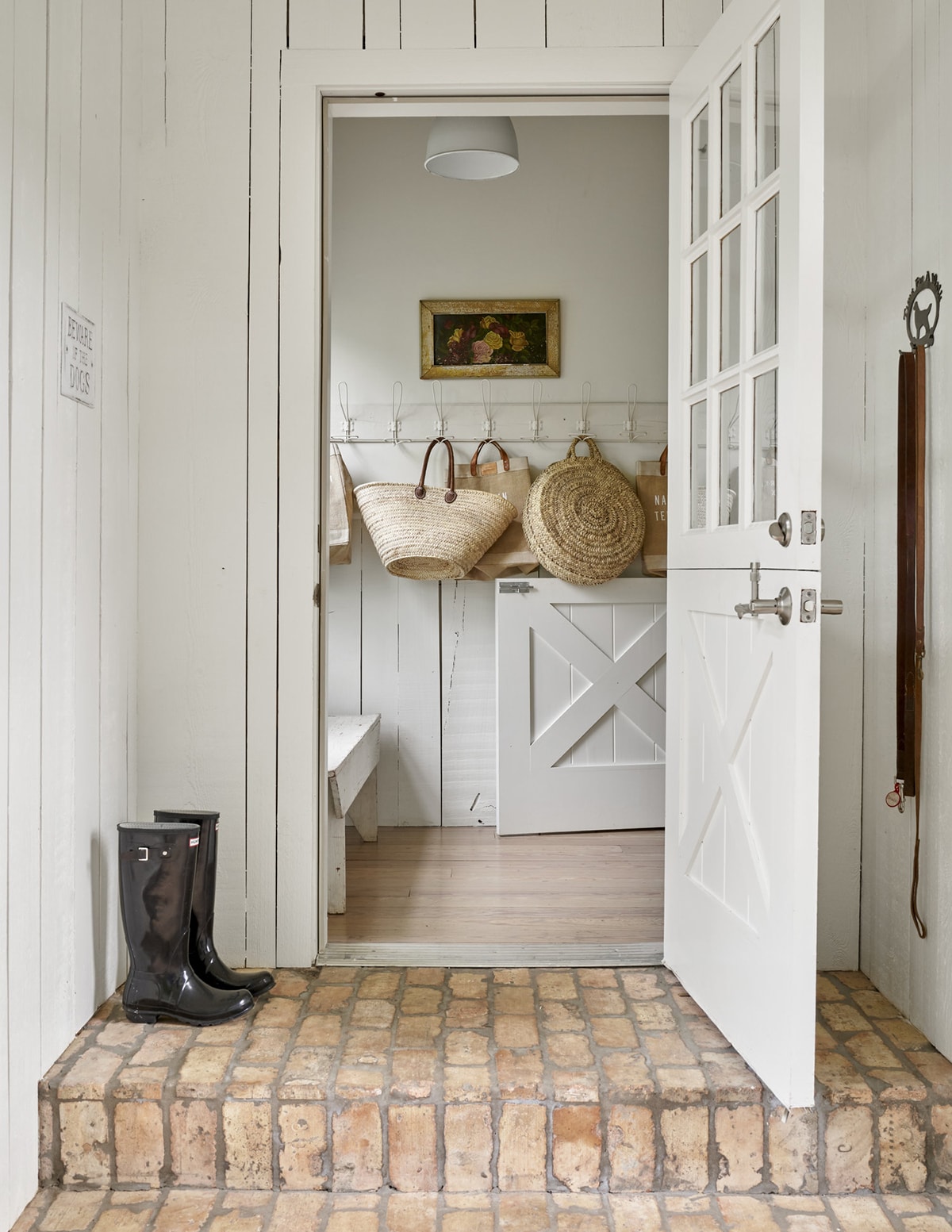 gorgeous mudroom idea french european farmhouse style with rack, brick floors and dutch door 