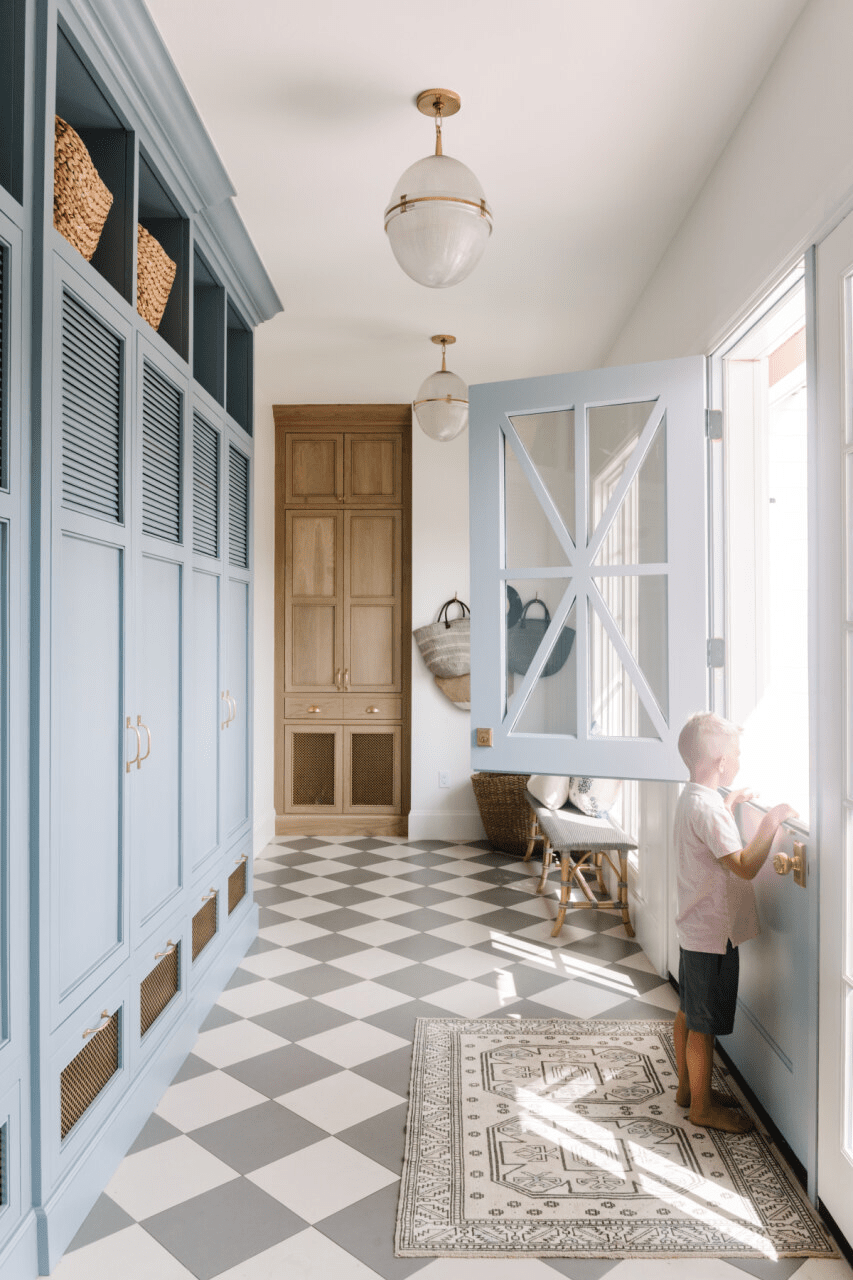 gorgeous mudroom idea blue cabinets checkerboard floors dutch door 