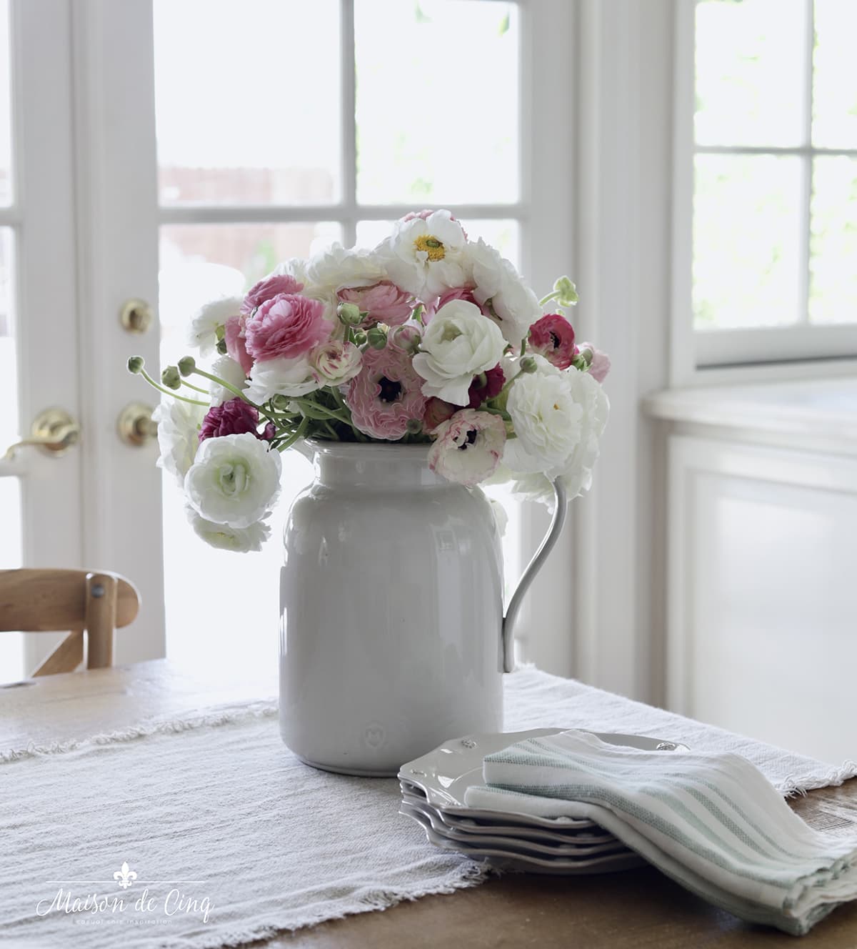 ranunculus in white pitcher in white kitchen summer decorating 