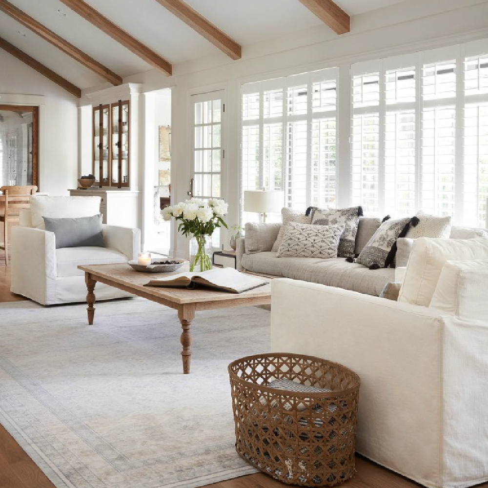 gorgeous French inspired rustic coffee table in neutral living room