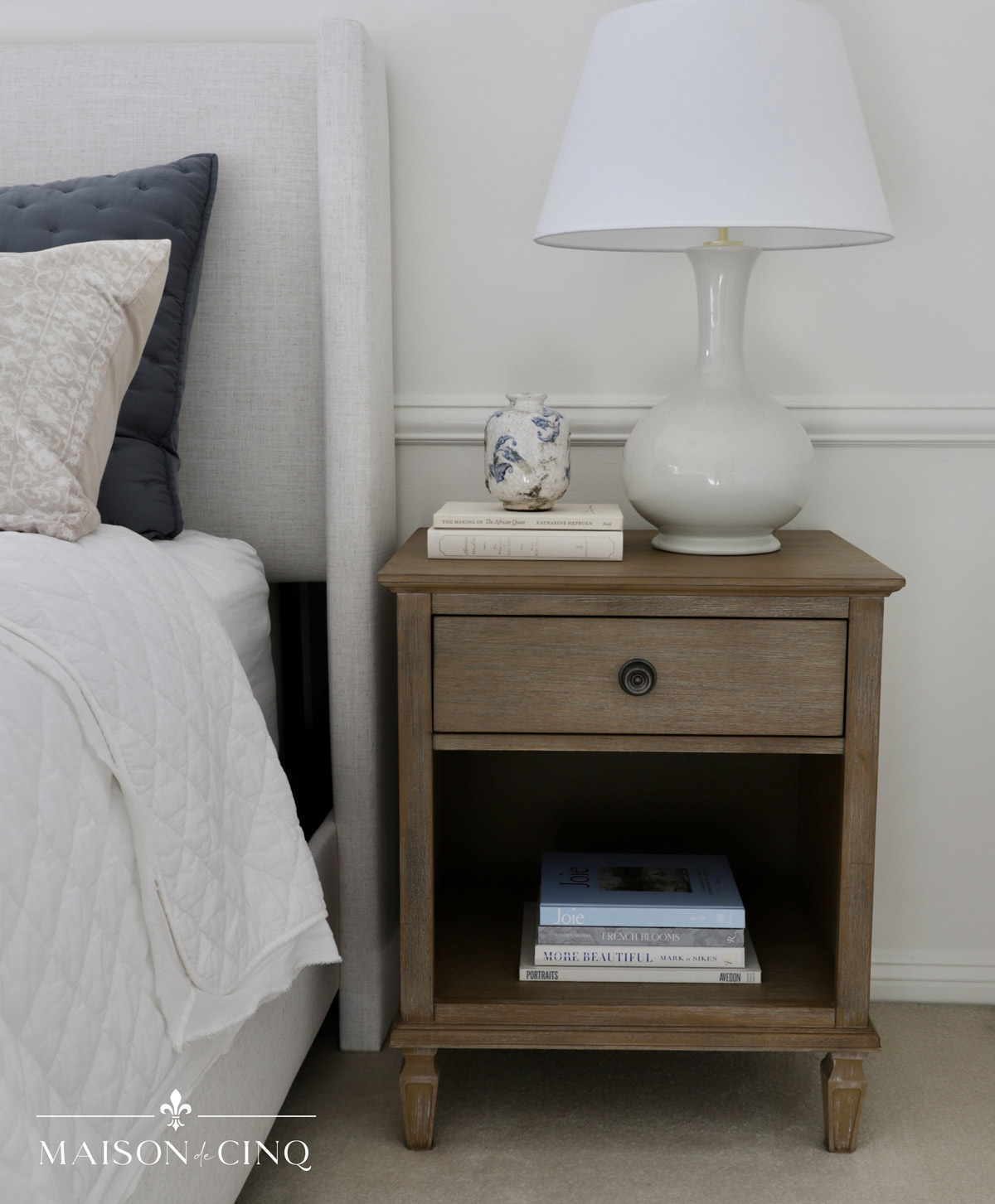 gorgeous French style nightstand in guest bedroom with neutrals 