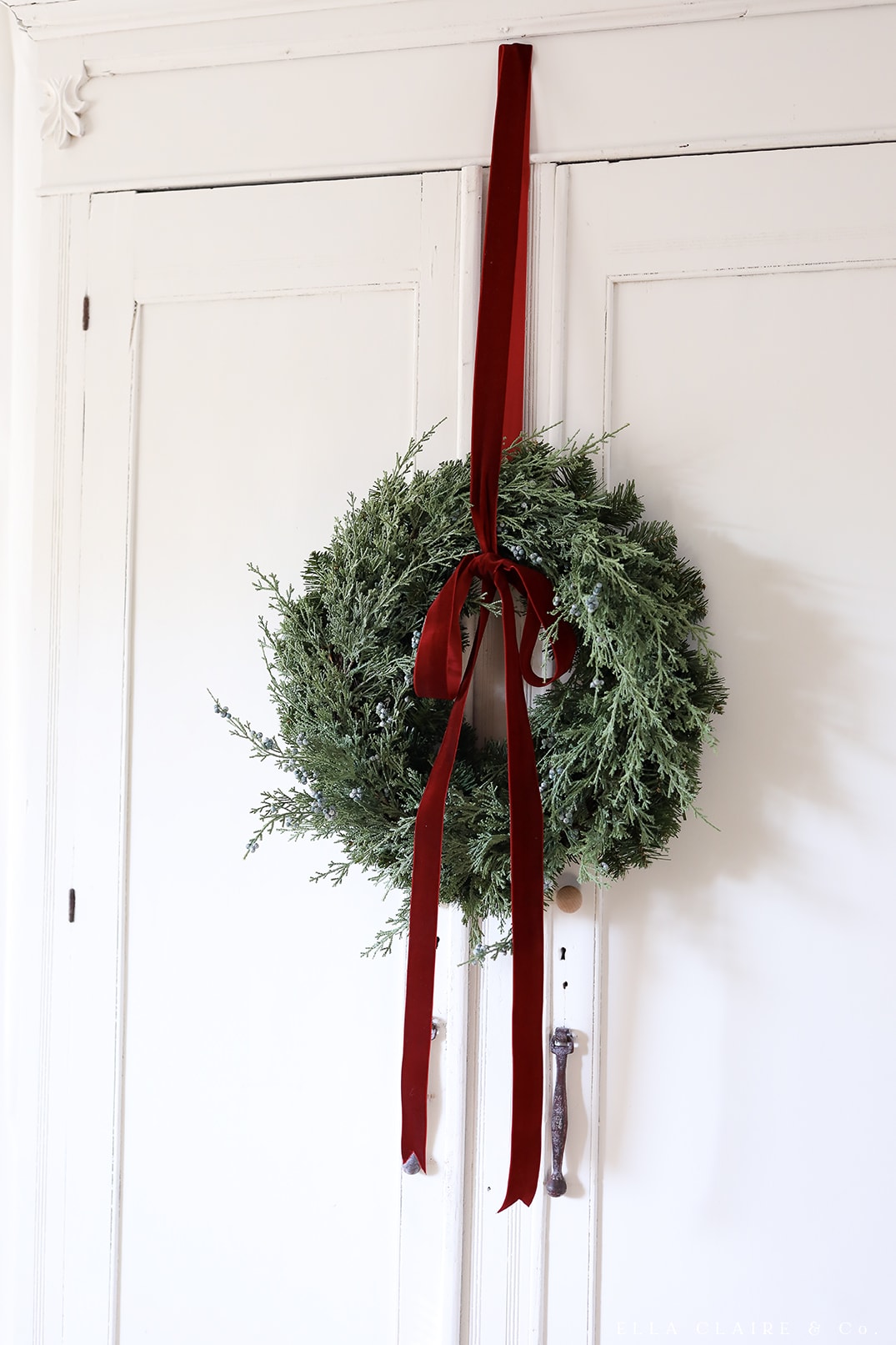 Holiday Decor Favorites from Wayfair Holiday Decor idea wreath with burgundy ribbon