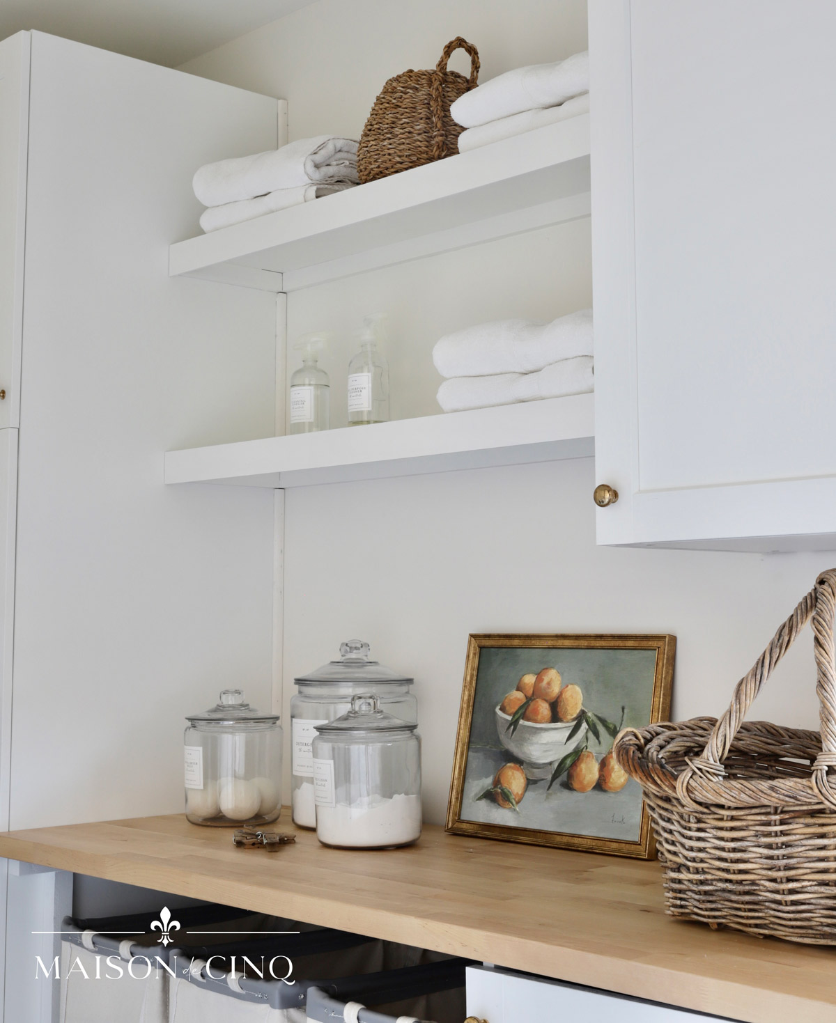 open shelving in garage laundry room area 