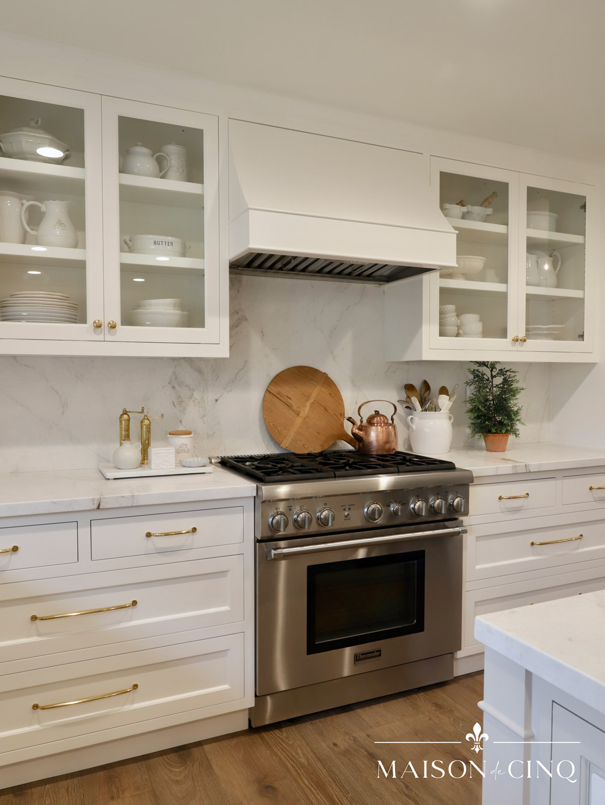 gorgeous French country white kitchen with glass cabinets holiday decor