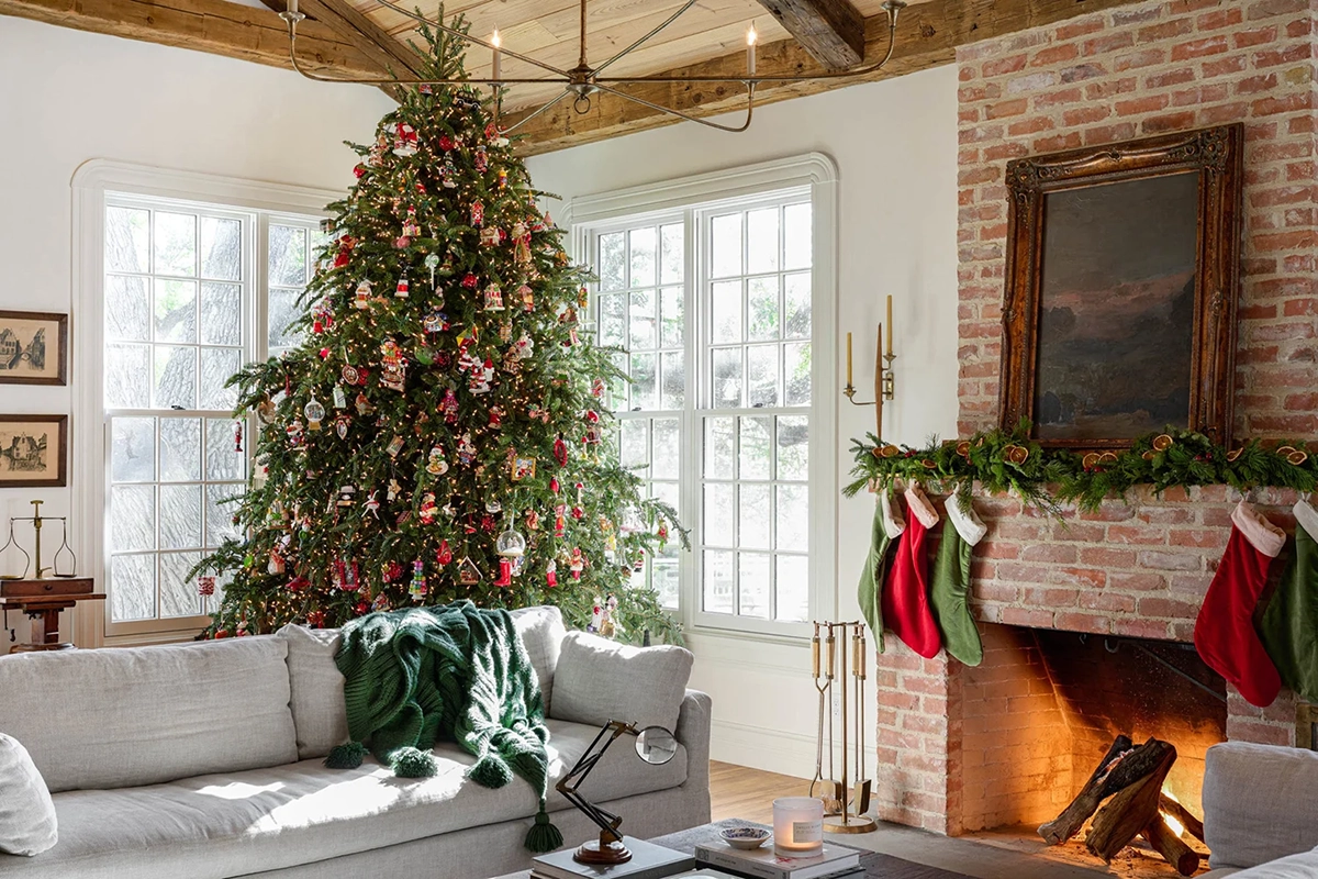 Classic Christmas Decor: 20 Stunning Ideas to Inspire stunning classic Christmas decor with red and green stocking on brick fireplace and tree