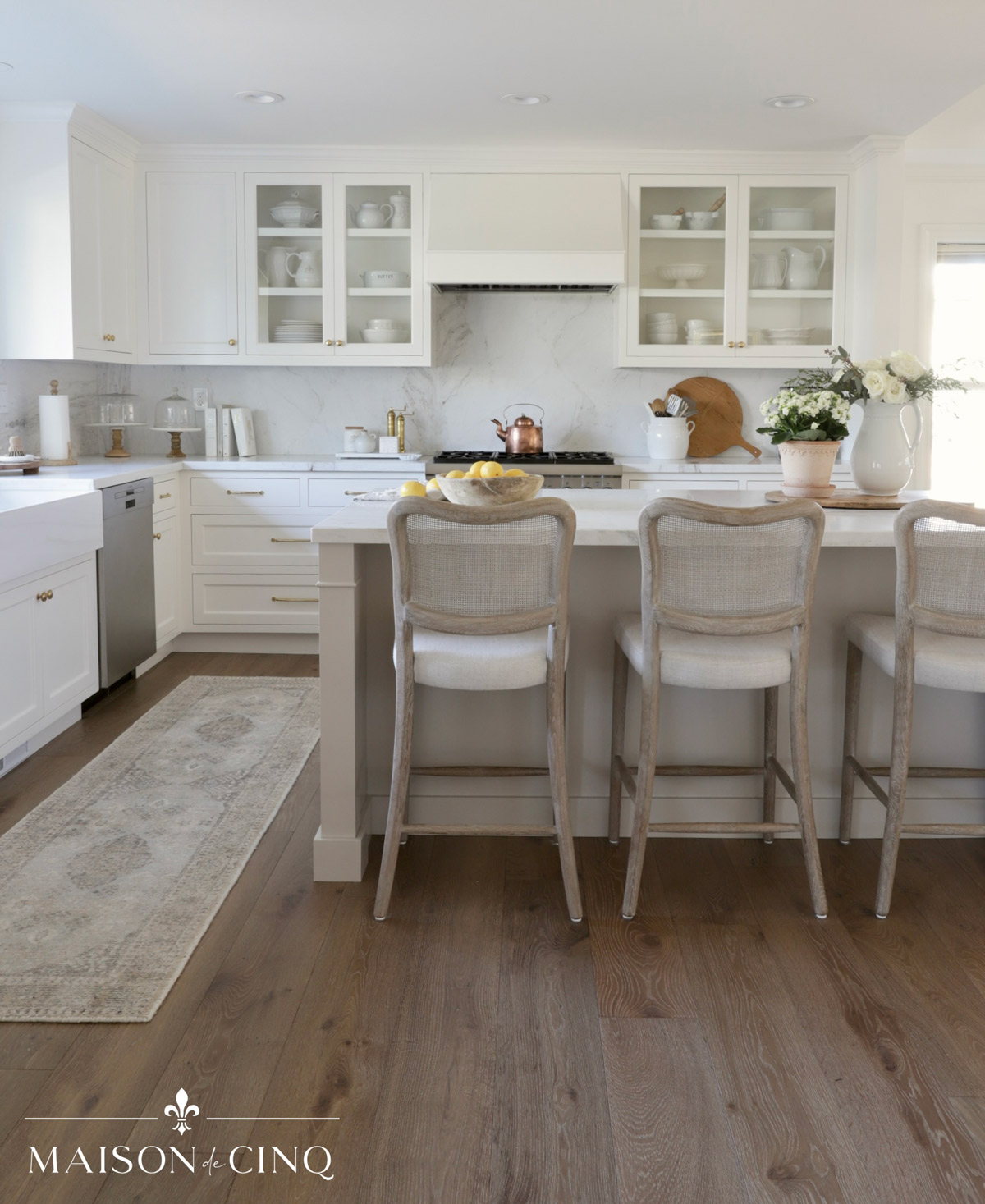 best selling gorgeous neutral rug runner in stunning white french-inspired kitchen 