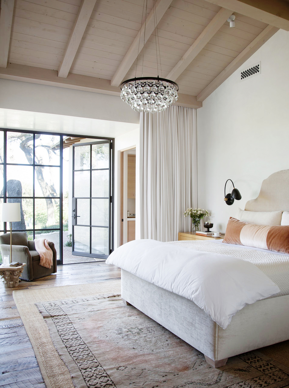 stunning bedroom with vaulted ceiling and chandelier elevating your bedroom
