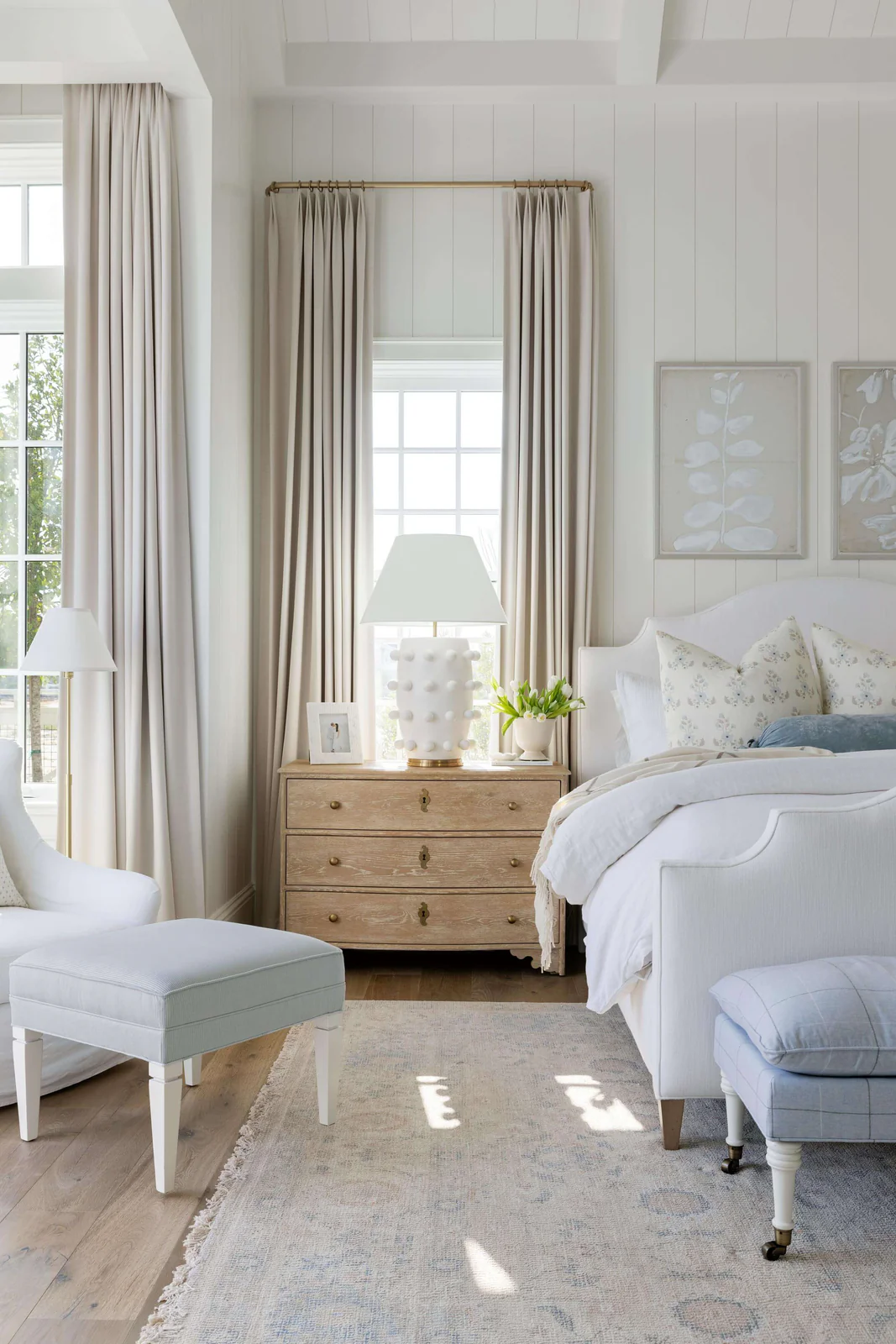 gorgeous bedroom with artwork and drapes elevating your bedroom