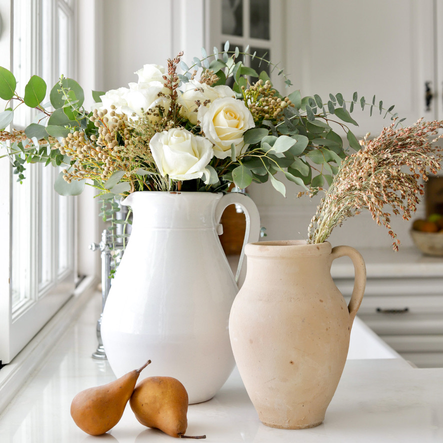 Vases on counter with fall decor